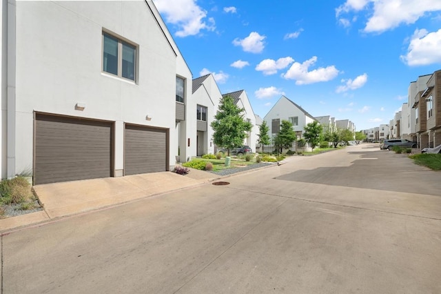 2608 Watkins Way, Austin, TX 78746 - view of concrete road with a residential view and curbs