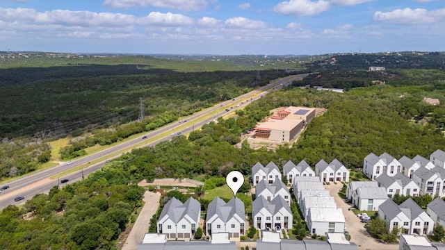2608 Watkins Way, Austin, TX 78746 - aerial perspective of suburban area with a heavily wooded area
