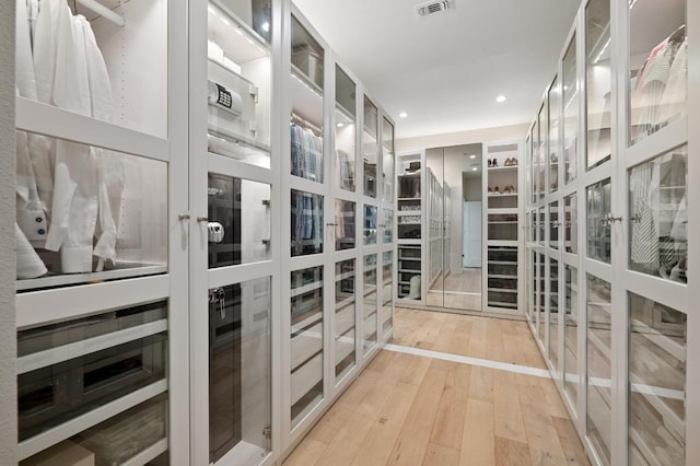 2608 Watkins Way, Austin, TX 78746 - walk in closet featuring light wood-style floors and french doors