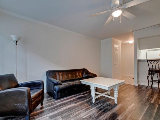 501 W 26th St Unit 102, Austin, TX 78705 - living area featuring wood finished floors, ceiling fan, and crown molding