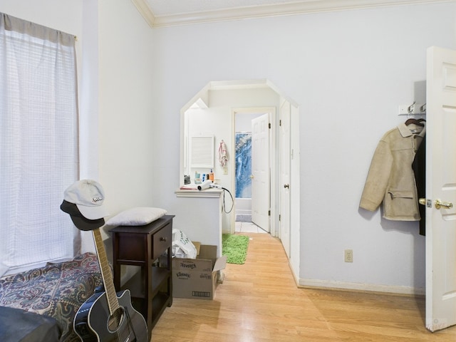 3111 Tom Green St Unit 208, Austin, TX 78705 - hall with ornamental molding, wood finished floors, and arched walkways