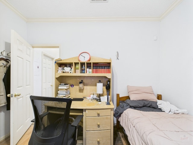 3111 Tom Green St Unit 208, Austin, TX 78705 - bedroom with crown molding, wood finished floors, and an office area