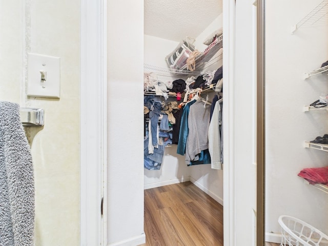 3111 Tom Green St Unit 208, Austin, TX 78705 - spacious closet featuring wood finished floors