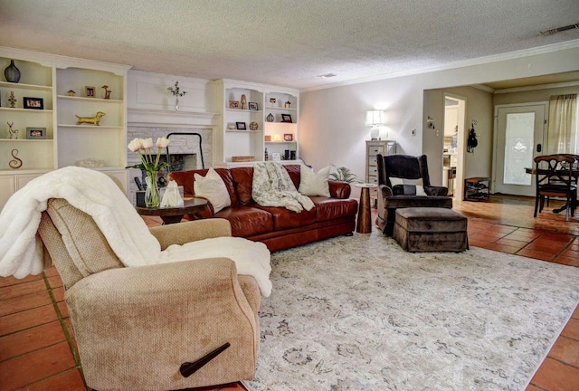 4703 Laguna Ln, Austin, TX 78746 - living area featuring ornamental molding, a textured ceiling, and a fireplace