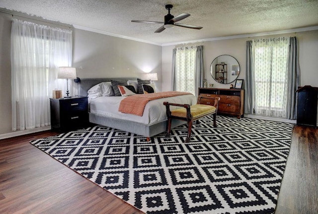 4703 Laguna Ln, Austin, TX 78746 - bedroom featuring wood finished floors, a textured ceiling, ornamental molding, and ceiling fan