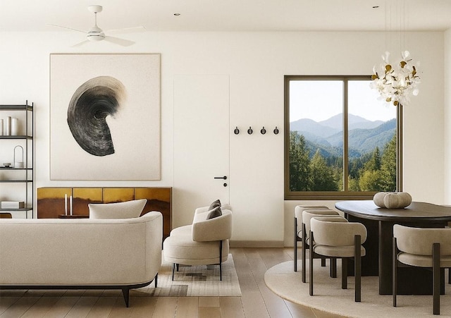 1208 Karen Ave Unit 3, Austin, TX 78757 - living room featuring a mountain view, hardwood / wood-style flooring, healthy amount of natural light, and a chandelier