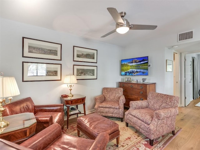 1503 W 9th St Unit 106, Austin, TX 78703 - living room featuring light wood finished floors and a ceiling fan
