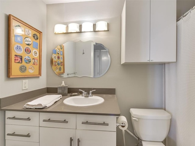 1503 W 9th St Unit 106, Austin, TX 78703 - bathroom featuring vanity and toilet