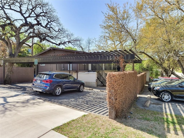 1503 W 9th St Unit 106, Austin, TX 78703 - covered parking lot featuring stairway