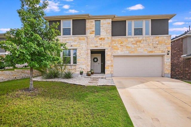 229 Mary Max Cir, San Marcos, TX 78666 - view of front of home featuring an attached garage, concrete driveway, stone siding, and a front yard