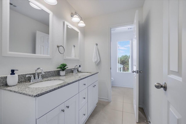 229 Mary Max Cir, San Marcos, TX 78666 - bathroom featuring double vanity and tile patterned flooring