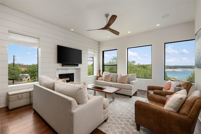 1404 Hurst Creek Rd, Austin, TX 78734 - living room with ceiling fan, a high end fireplace, wood finished floors, plenty of natural light, and recessed lighting