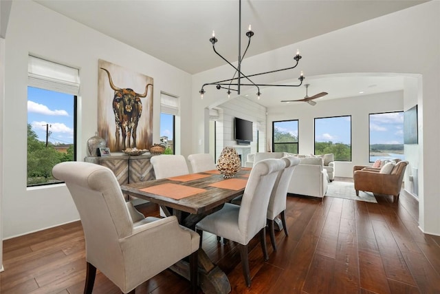 1404 Hurst Creek Rd, Austin, TX 78734 - dining room with a chandelier, dark wood-type flooring, and plenty of natural light