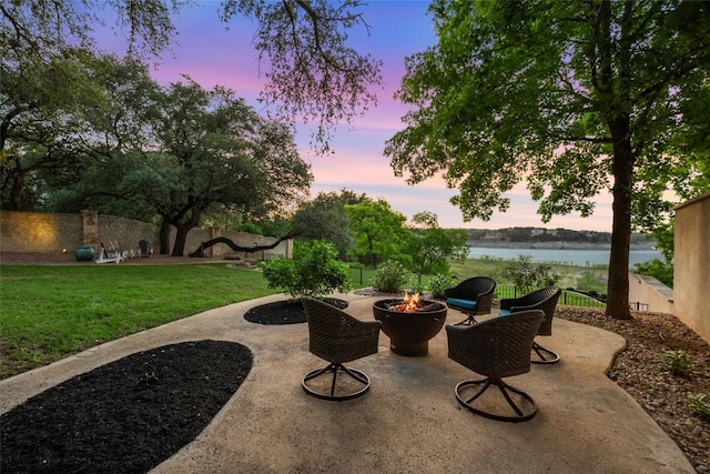 1404 Hurst Creek Rd, Austin, TX 78734 - view of patio / terrace with an outdoor fire pit and a water view
