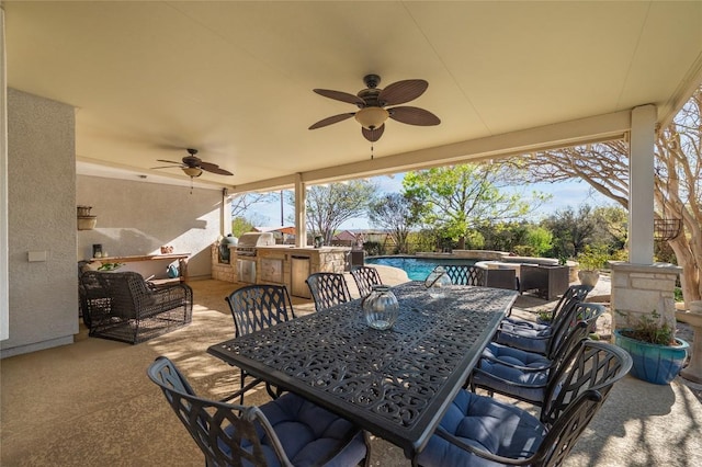 11208 Woodland Hills Trl, Austin, TX 78732 - view of patio / terrace with exterior kitchen, outdoor dining area, a ceiling fan, and an outdoor pool