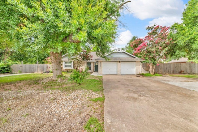 3705 Peach Vista Dr, Pflugerville, TX 78660 - view of front facade featuring a garage and concrete driveway