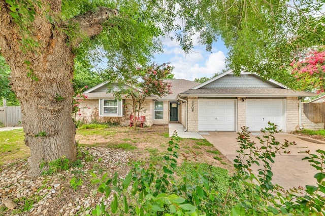 3705 Peach Vista Dr, Pflugerville, TX 78660 - single story home featuring concrete driveway, a garage, and stone siding