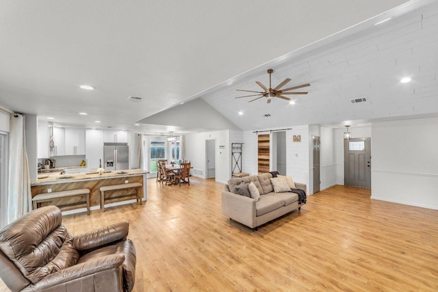 3705 Peach Vista Dr, Pflugerville, TX 78660 - living area with light wood-type flooring, ceiling fan, recessed lighting, and lofted ceiling