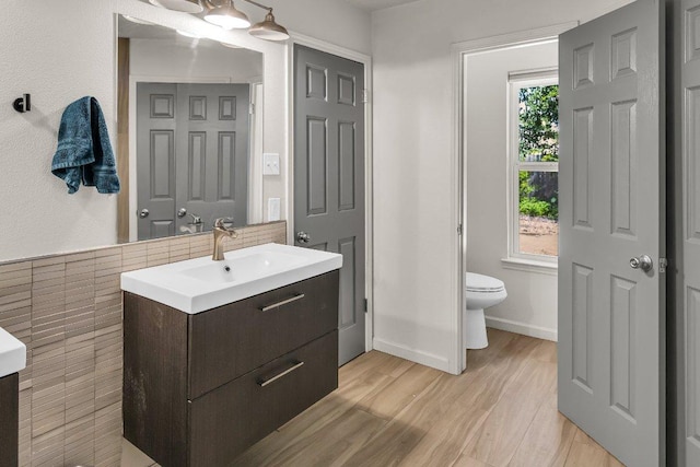 3705 Peach Vista Dr, Pflugerville, TX 78660 - bathroom featuring vanity and wood finished floors