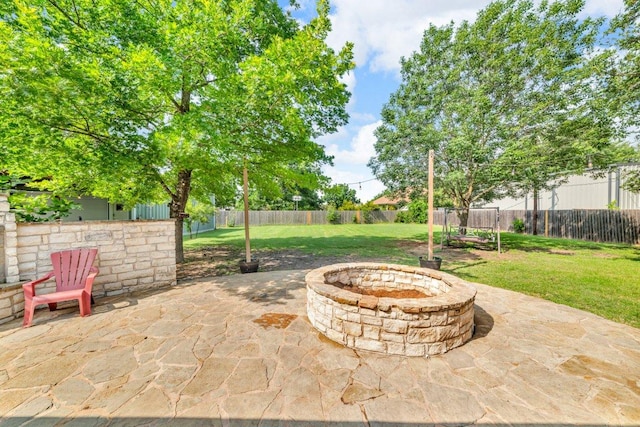3705 Peach Vista Dr, Pflugerville, TX 78660 - fenced backyard with a patio and a fire pit