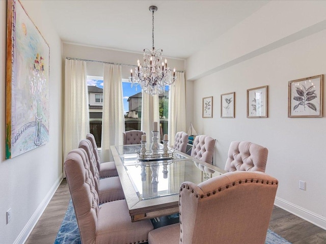 6701 Denia Dr, Austin, TX 78739 - dining room featuring a chandelier and wood finished floors