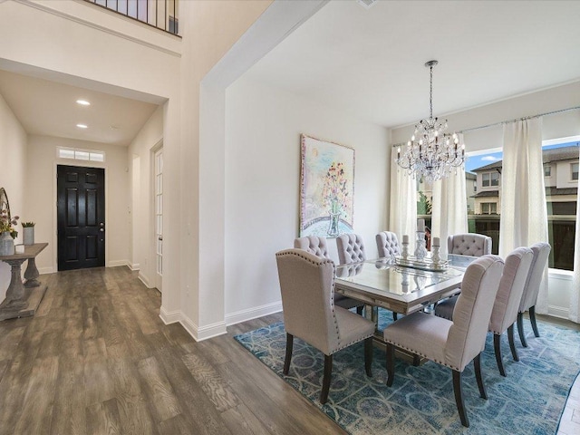 6701 Denia Dr, Austin, TX 78739 - dining area with a chandelier, wood finished floors, and recessed lighting