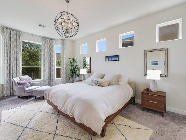 6701 Denia Dr, Austin, TX 78739 - bedroom with light carpet and a chandelier
