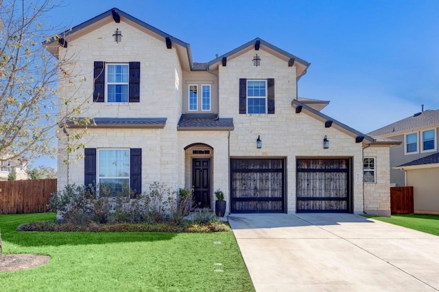 6701 Denia Dr, Austin, TX 78739 - view of front of property with stone siding, driveway, and an attached garage