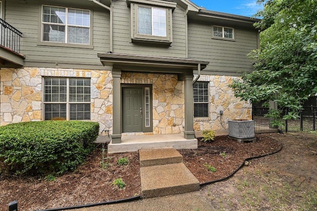 3101 Davis Ln Unit 6503, Austin, TX 78748 - doorway to property featuring stone siding