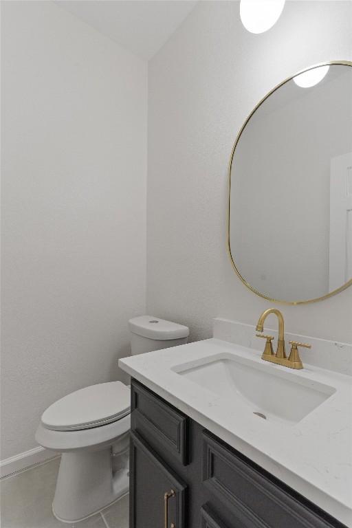 7401 Whistlestop Dr, Austin, TX 78749 - half bath with vanity and tile patterned flooring
