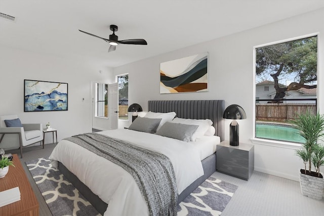7401 Whistlestop Dr, Austin, TX 78749 - carpeted bedroom featuring ceiling fan and baseboards