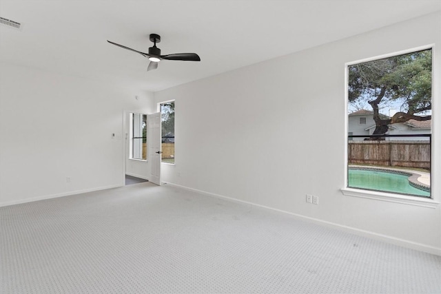 7401 Whistlestop Dr, Austin, TX 78749 - spare room with carpet flooring and a ceiling fan