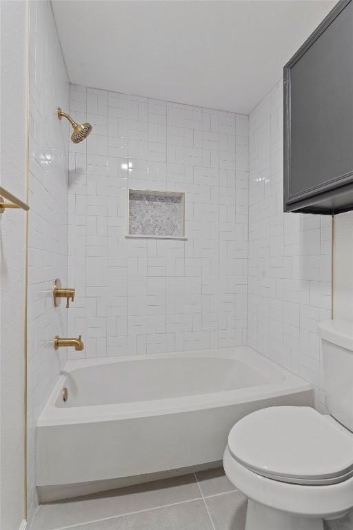 7401 Whistlestop Dr, Austin, TX 78749 - full bathroom featuring tile patterned floors and  shower combination