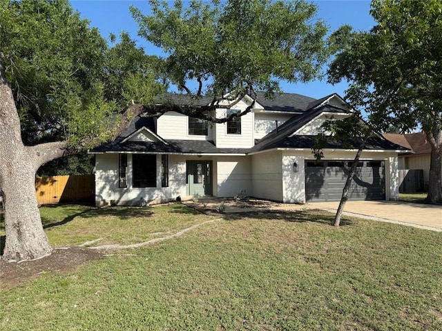 7401 Whistlestop Dr, Austin, TX 78749 - traditional-style home with an attached garage, driveway, and roof with shingles