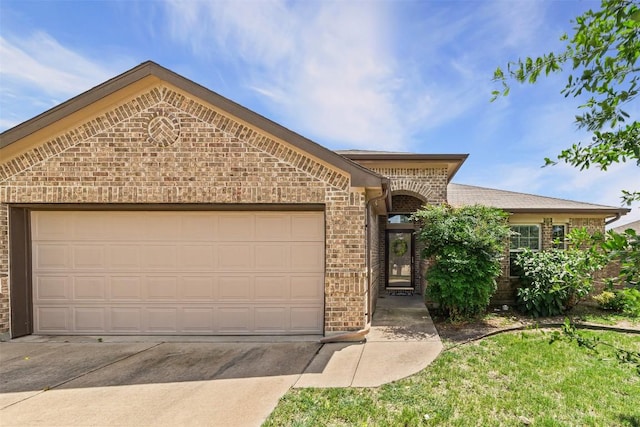 4019 Brookhaven Dr, Temple, TX 76504 - french country style house with brick siding, driveway, and a garage