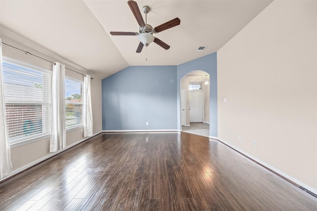 4019 Brookhaven Dr, Temple, TX 76504 - unfurnished room with vaulted ceiling, ceiling fan, arched walkways, and wood finished floors
