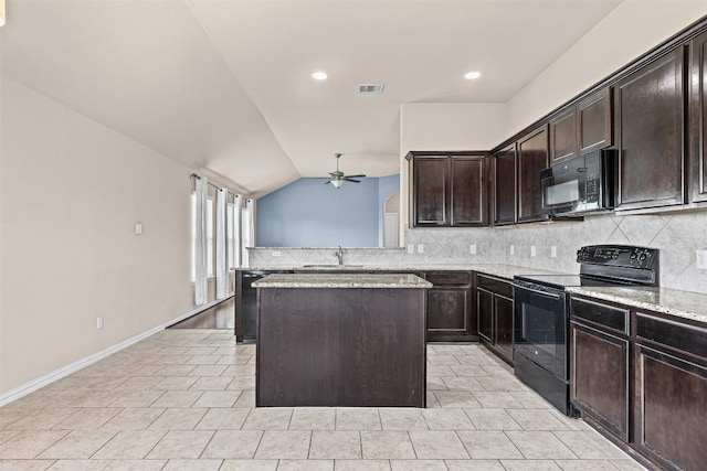 4019 Brookhaven Dr, Temple, TX 76504 - kitchen with black appliances, a ceiling fan, backsplash, light stone countertops, and a kitchen island