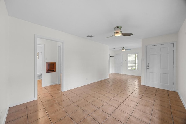 1807 W Saint Johns Ave, Austin, TX 78757 - empty room featuring light tile patterned floors and ceiling fan