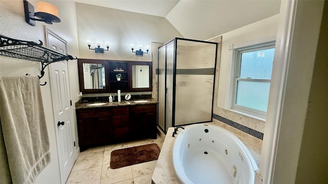 1127 Robin Rd, Elgin, TX 78621 - bathroom featuring a stall shower, a whirlpool tub, double vanity, and vaulted ceiling