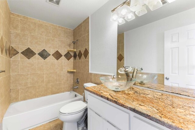 12212 Ballerstedt Rd, Elgin, TX 78621 - bathroom with vanity, tub / shower combination, and tile patterned floors