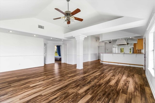 12212 Ballerstedt Rd, Elgin, TX 78621 - unfurnished living room with a ceiling fan, wood finished floors, lofted ceiling, decorative columns, and recessed lighting