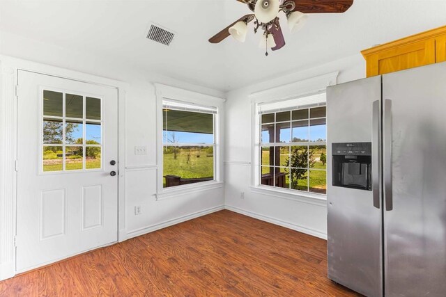 12212 Ballerstedt Rd, Elgin, TX 78621 - entryway with dark wood-type flooring and a ceiling fan