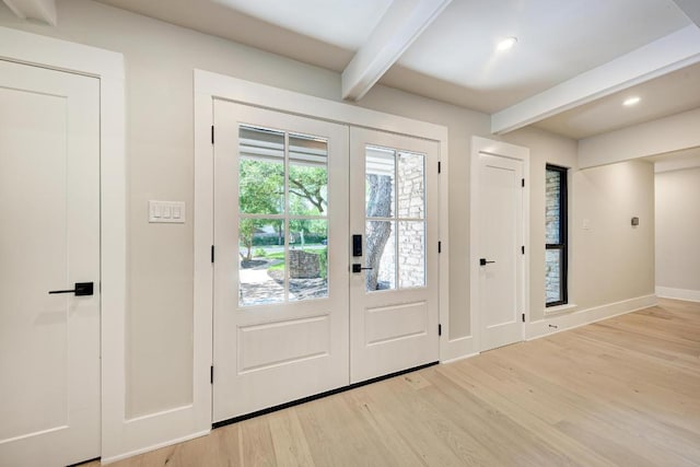 10507 Spicewood Pkwy, Austin, TX 78750 - foyer featuring beam ceiling, french doors, wood finished floors, and recessed lighting