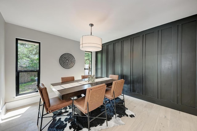 10507 Spicewood Pkwy, Austin, TX 78750 - dining space with light wood-style floors and healthy amount of natural light