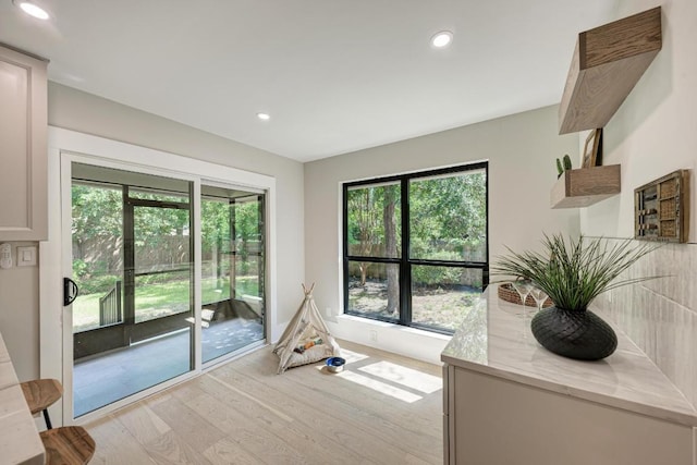 10507 Spicewood Pkwy, Austin, TX 78750 - living room featuring light wood-style floors and recessed lighting