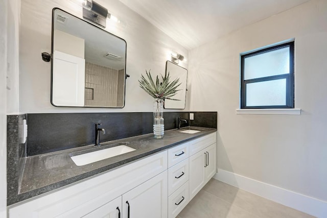 10507 Spicewood Pkwy, Austin, TX 78750 - bathroom featuring tile patterned floors and double vanity
