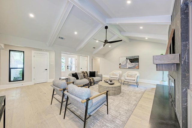 10507 Spicewood Pkwy, Austin, TX 78750 - living area with a fireplace, light wood finished floors, recessed lighting, and a ceiling fan