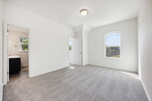 123 Pond View Pass, Buda, TX 78610 - unfurnished room featuring light colored carpet and plenty of natural light