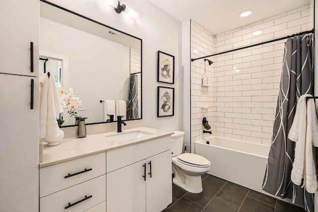 3101 Govalle Ave Unit 103, Austin, TX 78702 - bathroom featuring vanity, shower / bath combo, and tile patterned floors