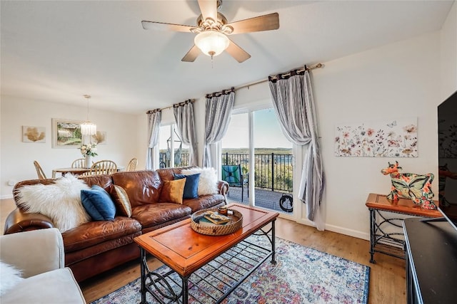 3216 Poe Cv Unit 5D, Lago Vista, TX 78645 - living area featuring light wood-style floors and ceiling fan